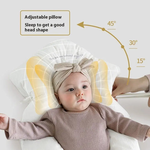 Baby lying on a head shaping pillow with adjustable angles and text indicating its use for good head shape.