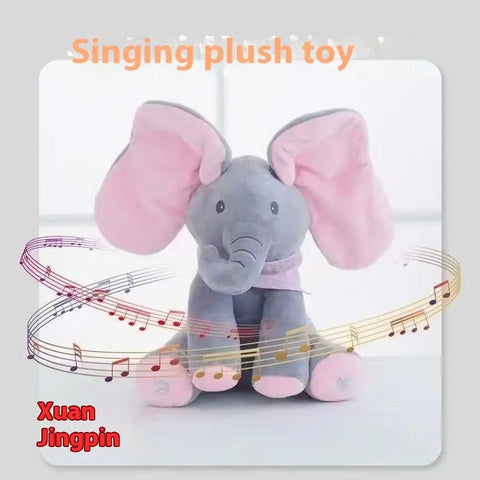 Gray and pink plush toy elephant with musical notes, labeled 'Singing plush toy' and 'Xuan Jingpin'.