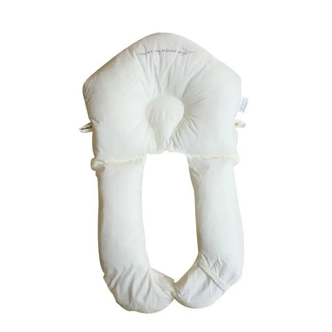 White U-shaped pillow on a white background